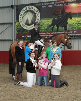Kingsbarn Equestrian Centre’s young riders present Scott Brash with a present